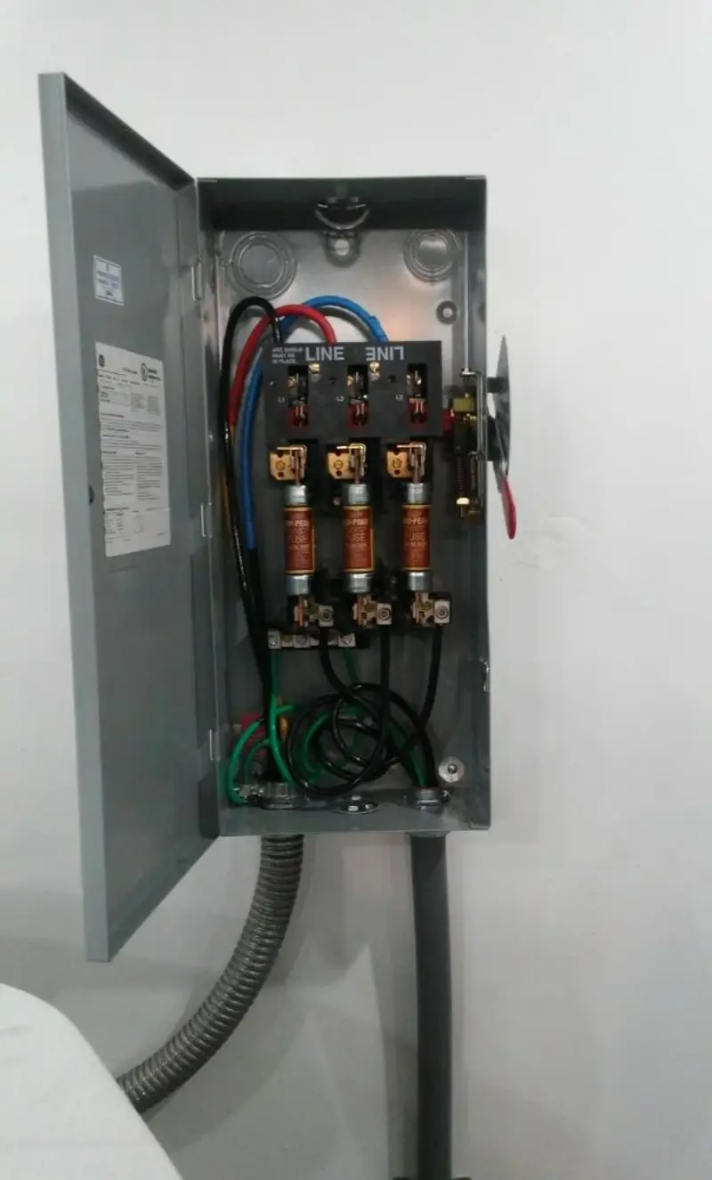 Three-phase disconnect switch installed for Smoke Detector Installation in Rockledge